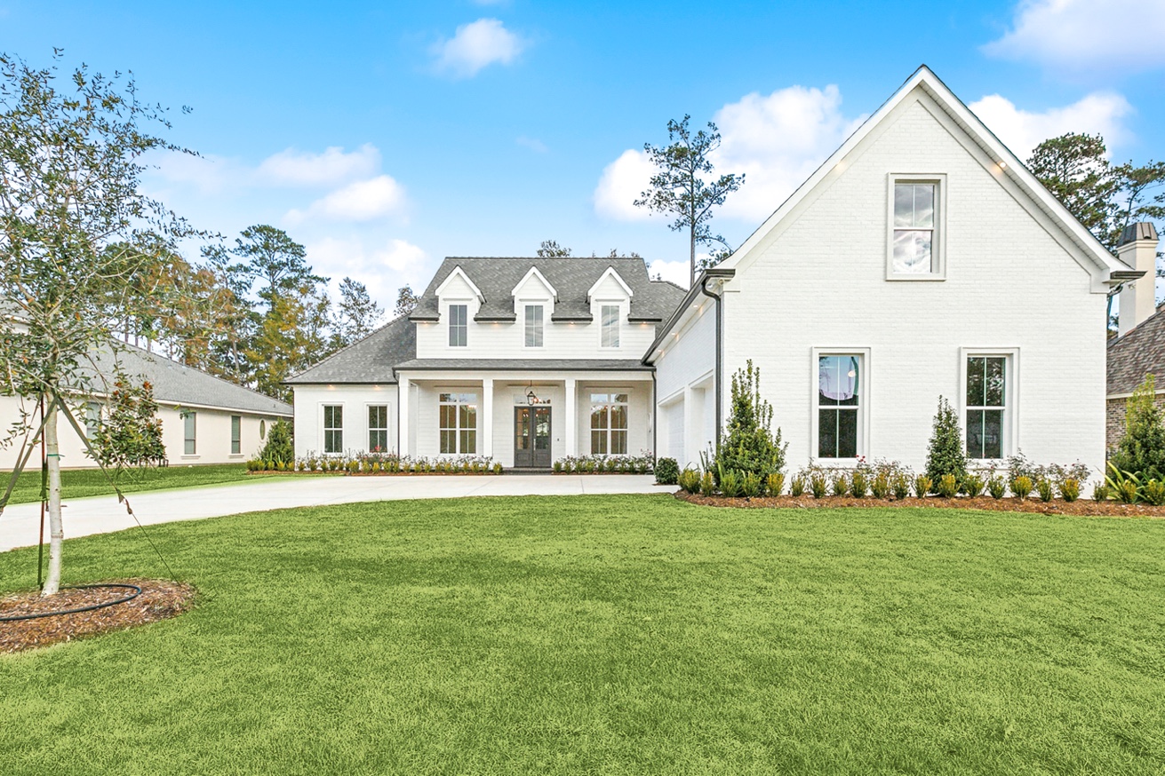 Luxury custom home with brick and modern design